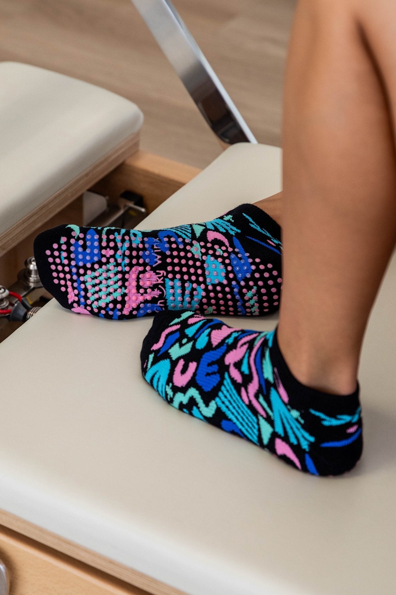 Black Fiesta X Deb McNaughton non-slip grip socks for Pilates reformer and barre by Cheeky Winx Australia