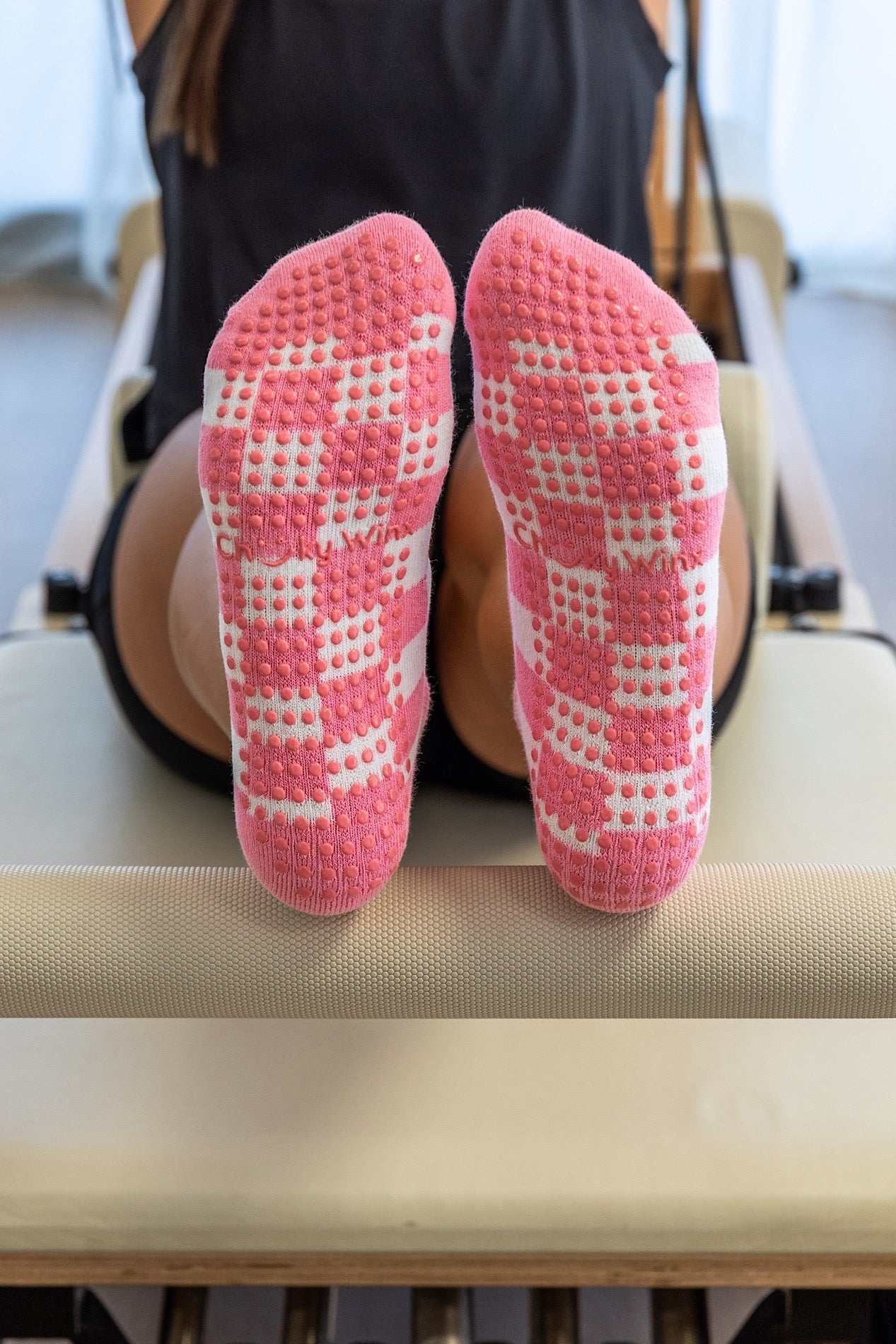Pink Checker non-slip grip socks for Pilates reformer and barre by Cheeky Winx Australia